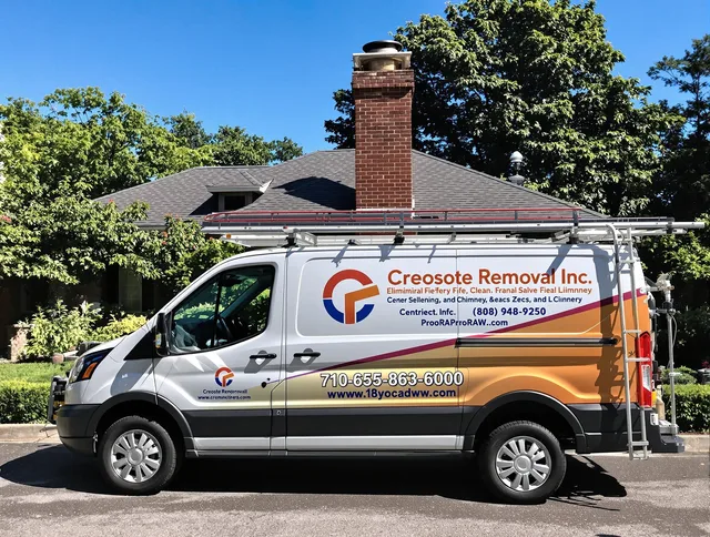 Cape Coral Chimney Sweep technician removing creosote safely in Cape Coral, FL
